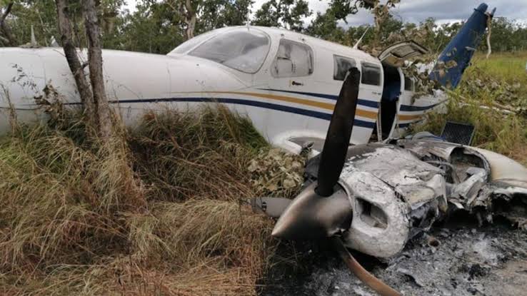 Plane overloaded with cocaine crashes on take-off in Australia.