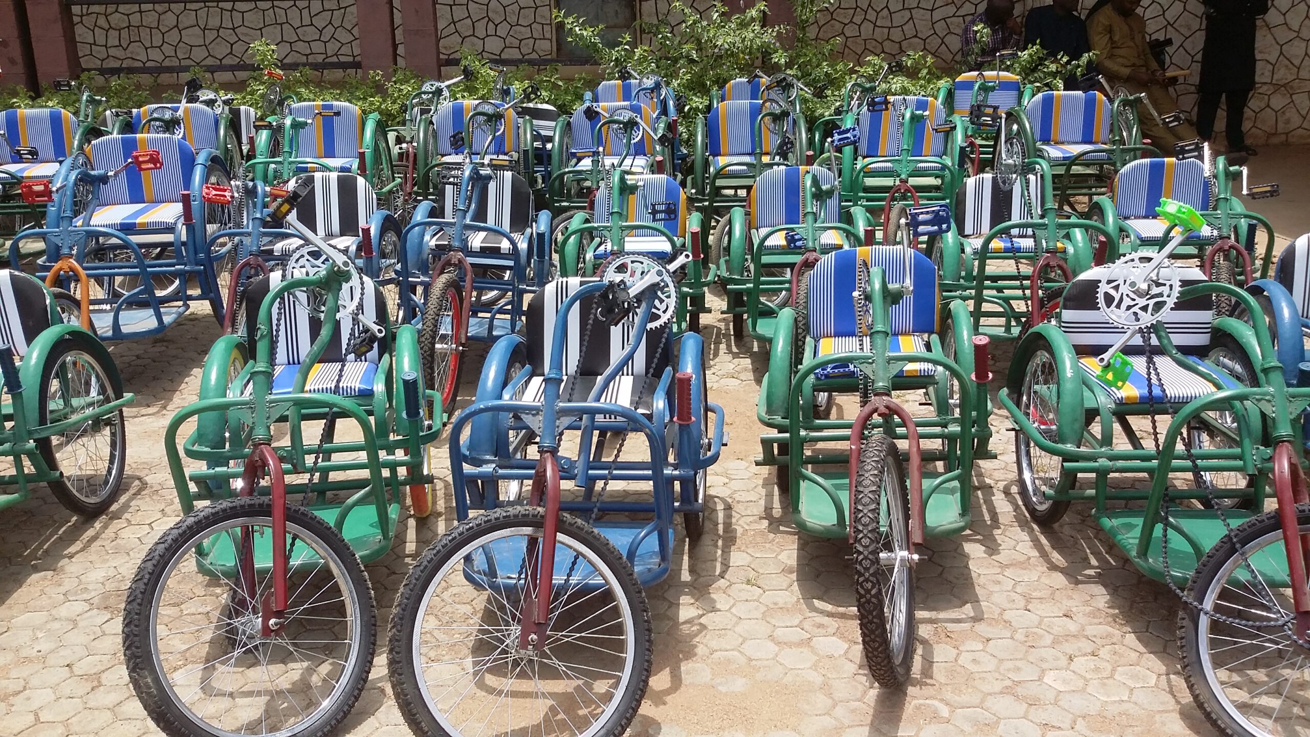 Chief Burki put smiles on People with Disabilities in Jos North, as he distributes 50 wheelchairs.
