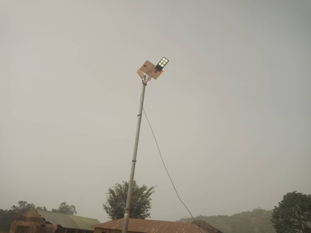Dr Elkanah Garang donates Solar Street Light and GSM Signal Booster in Bokkos